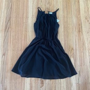 Francesca’s black dress